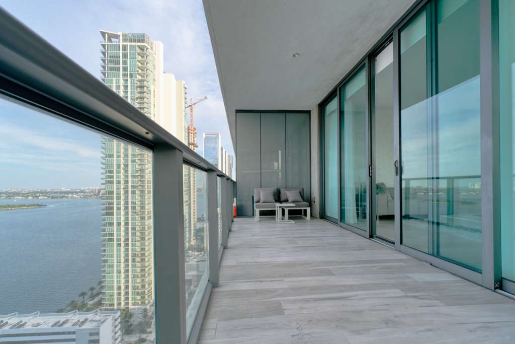 Terrace seating and panoramic Miami view